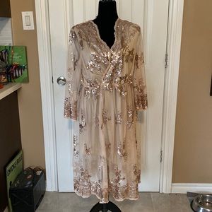 Very dressy summer dress.  Never worn.  Ordered online last summer